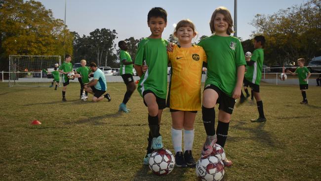 Seb Palazzo-Orr, Lucia Palazzo-Orr and Makus Bachmayer from Ipswich Knights Soccer Club training before the Matildas vs England semi-final clash in Ipswich. Photos by Georgie Walker.