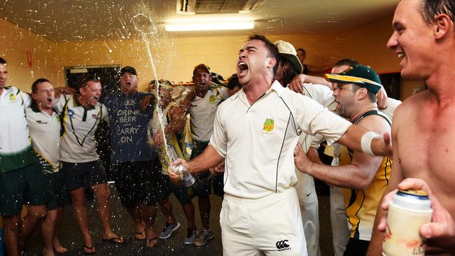 Richie Hodgson and the PINT team celebrate a victory over Waratah at the District Cricket Grand Final.