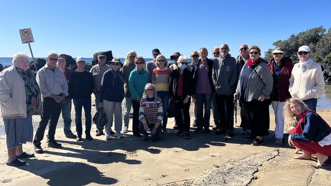 More than 20 Bargara residents lined the foreshore on Wednesday morning, July 13, 2022, where they discussed the issue and Bundaberg Regional Council’s public consultation time frames for amendments to building heights.