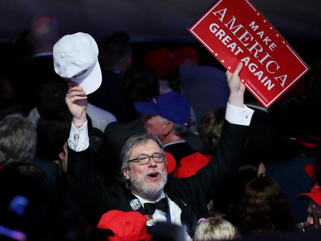 NEW YORK, NY - NOVEMBER 09: Supporters of Republican presidential nominee Donald Trump cheer during the election night event at the New York Hilton Midtown on November 8, 2016 in New York City. Americans today will choose between Republican presidential nominee Donald Trump and Democratic presidential nominee Hillary Clinton as they go to the polls to vote for the next president of the United States. Mark Wilson/Getty Images/AFP == FOR NEWSPAPERS, INTERNET, TELCOS & TELEVISION USE ONLY ==