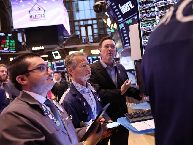 NEW YORK, NEW YORK - NOVEMBER 07: Traders work on the floor of the New York Stock Exchange during the morning trading on November 07, 2024 in New York City. Stocks rose slightly at the opening, a day after the Dow Jones closed up over 1,500 points following former President Donald Trump's win in the 2024 presidential election. The gain was the market's biggest jump in two years. The S&P 500 and Nasdaq Composite also closed at all time highs. The market is also expecting an interest-rate decision from the Federal Reserve Bank later today.   Michael M. Santiago/Getty Images/AFP (Photo by Michael M. Santiago / GETTY IMAGES NORTH AMERICA / Getty Images via AFP)