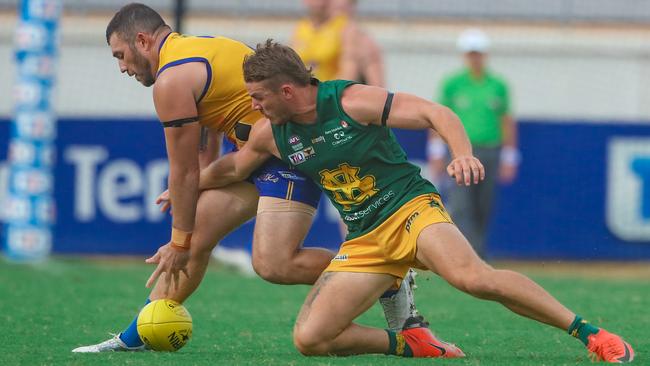 Jared Erlandson (L) and Liam Taylor during the NTFL's Round 18 match, St Mary's v Wanderers at TIO Stadium. Picture Glenn Campbell