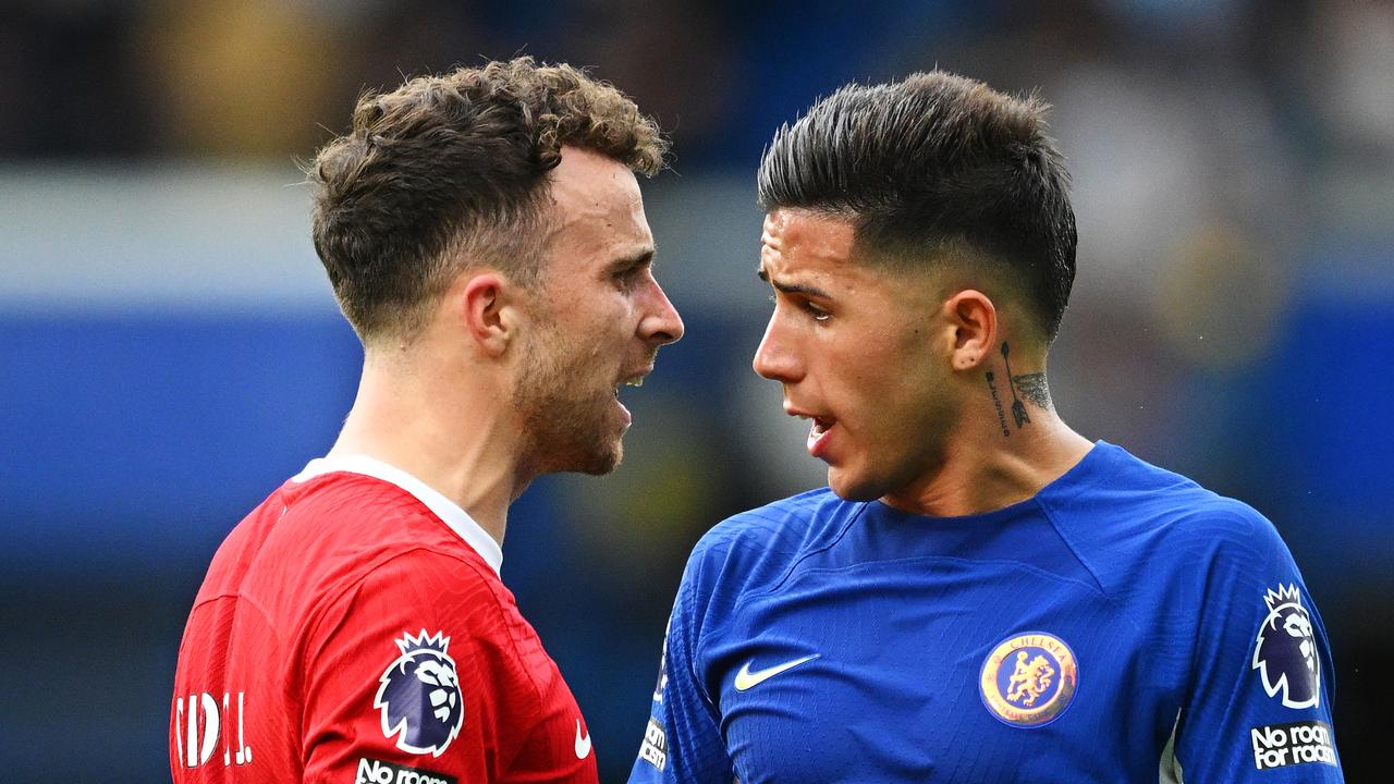 LONDON, ENGLAND - AUGUST 13: Diogo Jota of Liverpool clashes with Enzo Fernandez of Chelsea during the Premier League match between Chelsea FC and Liverpool FC at Stamford Bridge on August 13, 2023 in London, England. (Photo by Clive Mason/Getty Images)