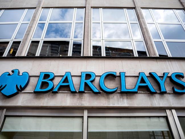 (FILES) In this file photo taken on October 22, 2017 Signage is seen at the front of a branch of Barclays bank in central London. - British banking giant Barclays said on April 29, 2020, that net profit tumbled 42 percent in the first quarter, hit by the economic shock sparked by the deadly novel coronavirus. Earnings after taxation slumped to £605 million ($754 million, 558 million euros) in the three months to the end of March compared with £1.04 billion a year earlier, Barclays said in a results statement. (Photo by Tolga Akmen / AFP)