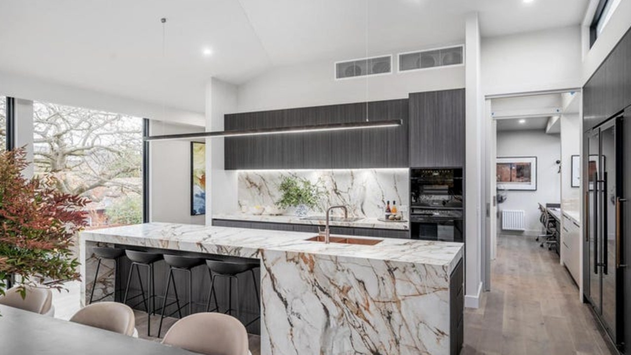 A striking kitchen added to the home’s modern aesthetic.