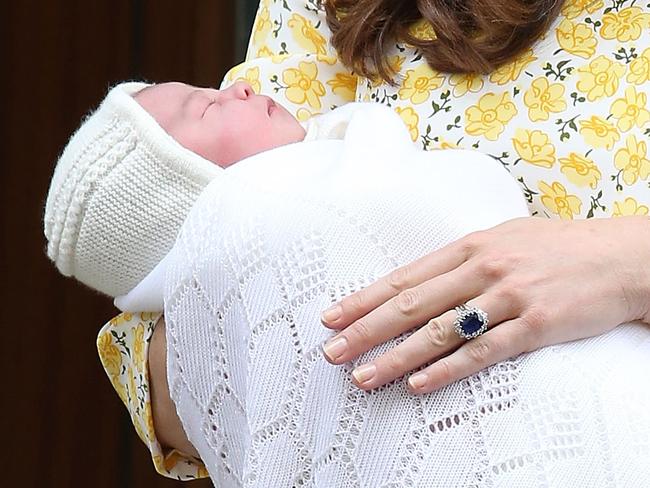 She’s been alive for mere hours, but the princess is already owning hat fashion.