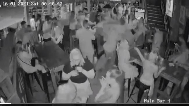 Les Walker gets knocked unconscious by a man at the Mad Cow tavern