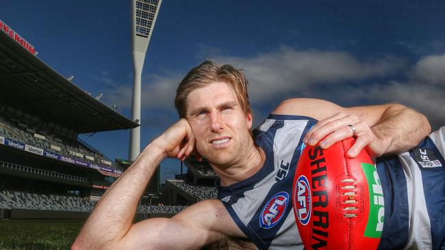 Geelong footballer Tom Lonergan on the spot where almost 10 years ago he lost a kidney during a game. Picture: Colleen Petch.