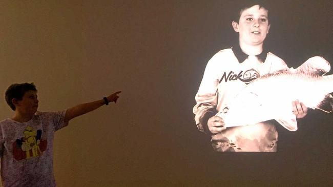 Nick Fish in front of his Rockhampton Riverfest laneway movie. Picture: contributed