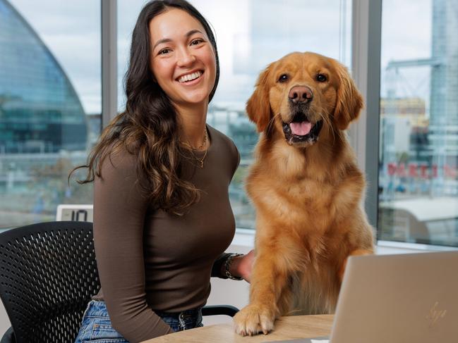 Daily Telegraph. 17, June, 2024.Jess Walker, with her dog Magnus, at work in Sydney CBD, today. (Story - Bring your Dog to work day) Picture: Justin Lloyd.