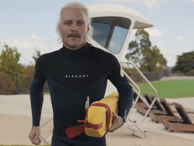 Valtteri Bottas recreates Baywatch at the Urbnsurf park. Picture: Supplied