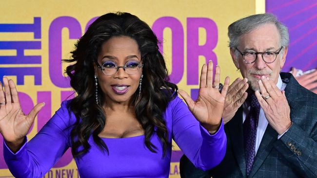Producers Steven Spielberg Oprah Winfrey at the world premiere of The Color Purple in Los Angeles in December. Picture: Frederic J. Brown/AFP)