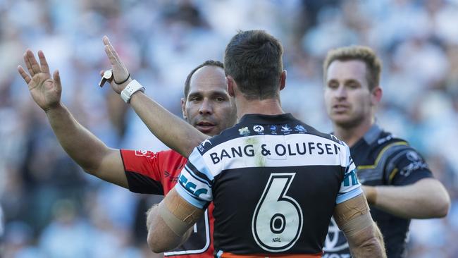 Assistant referee Ashley Klein sends James Maloney to the sin bin in the shadows of half time.