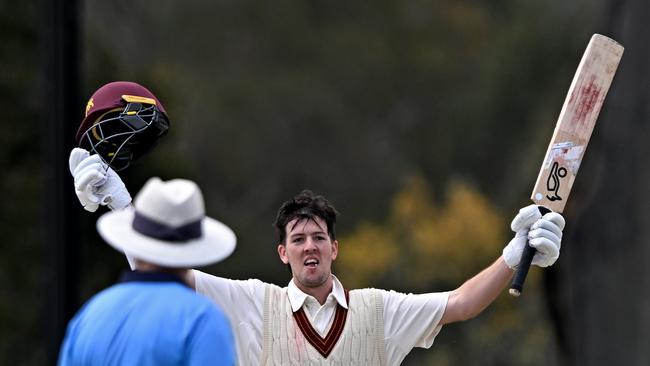 Zachary Elliott celebrates scoring his century. Picture: Andy Brownbill