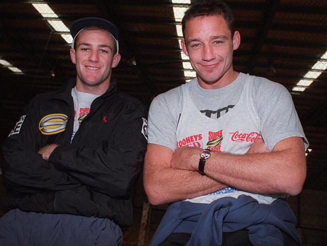 Brothers Matt (L) and Mark Geyer pose together before training with Perth Reds Super League team in 1997.