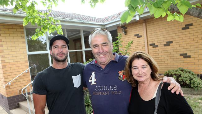 Auction at 100 Apex Ave, Belmont. New owner Alistair Lindeman with his parents Peter and Carol Lindeman. picture: Glenn Ferguson