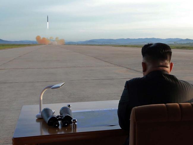 Kim Jong-un inspecting a launching drill of the medium-and-long range strategic ballistic rocket Hwasong-12. Picture: AFP