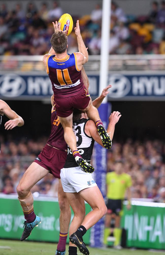 Lincoln McCarthy takes an absolute hanger for the Lions. Will he be good to go in Round 4? Picture: AAP