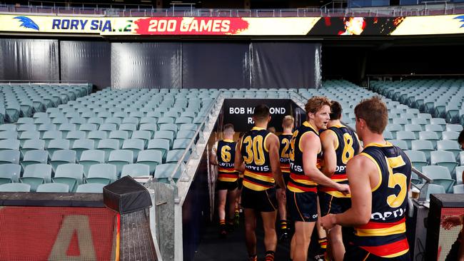 Adelaide walks off the field and fans hope there club can survive the COVID-19 related financial crisis. Picture: Daniel Kalisz/Getty.