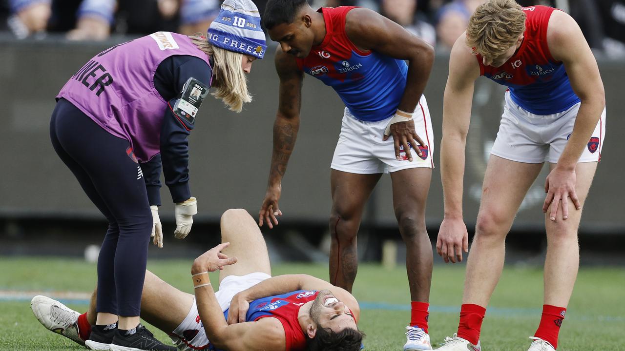 Melbourne star Christian Petracca was hospitalised for days and underwent harrowing emergency surgery but initially returned to the field following a first-quarter collision in the King’s Birthday game. Picture: Michael Klein