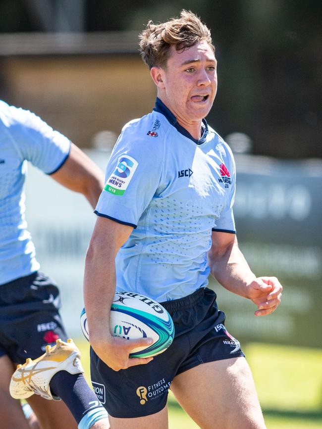 Rex Bassingthwaighte on his way to a try. Picture: Julian Andrews