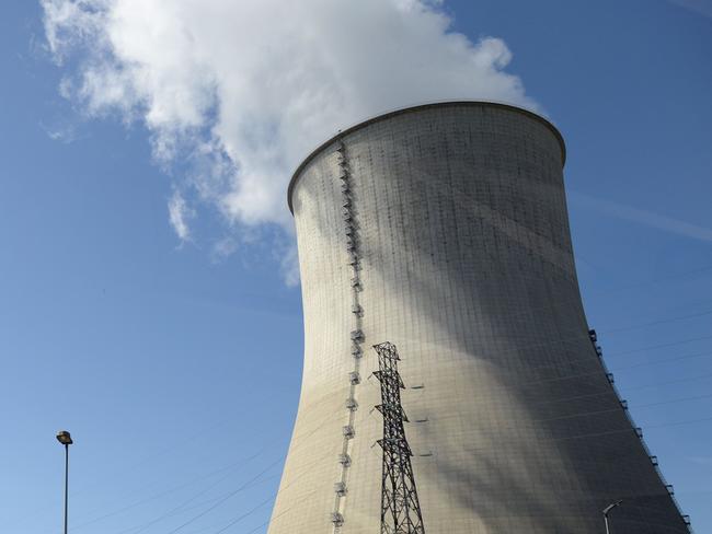 (FILES) In this file photo taken on May 10, 2017, shows cooling towers of the nuclear power plant in Chooz, northern France. - One of the reactors of the nuclear power station of Chooz has been shut down since midnight August 21, 2020, and its second reactor is likely to also be shut down soon due to the low flow of the Meuse River, according to the site's management. (Photo by FRANCOIS LO PRESTI / AFP)