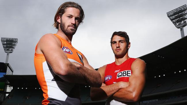 Callan Ward of GWS Giants and Josh Kennedy of the Sydney Swans pose at the MCG. (Photo by Michael Dodge/Getty Images)