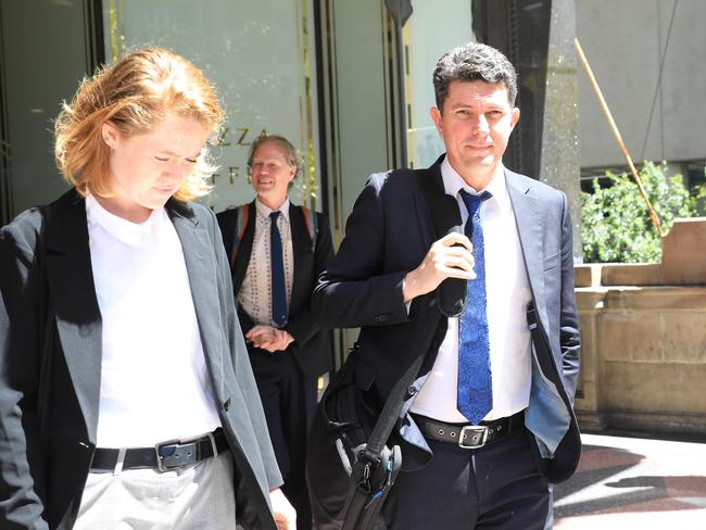 Protest organiser Lilian Rose Campbell and former Australian senator Scott Ludlum (Centre) outside the Downing Centre in Sydney on Monday October 12. Picture: NCA NewsWire / Christian Gilles