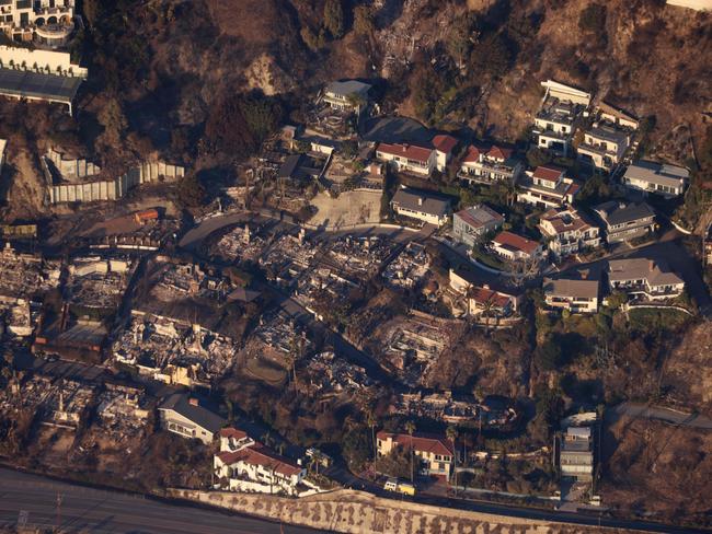 This aerial photo shows homes and businesses reduced rubble by the Palisades fire in the Pacific Palisades neighbourhood. Picture: AFP