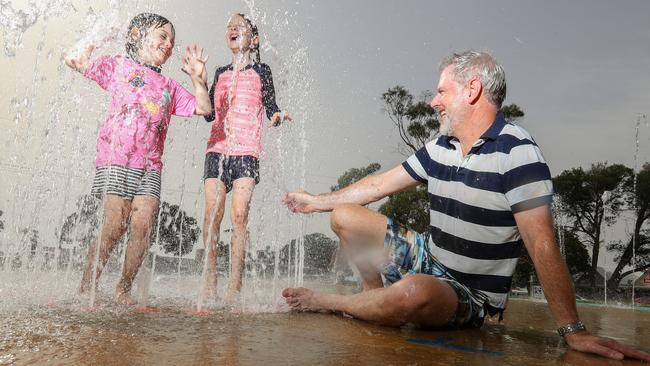 HOLD FOR HERALD SUN PIC DESK----East Gippsland tourism in fire affected areas, in attempts to draw the crowds back to seaside locations and small country towns. Metung. Patrick Carson and his daughters Arabella, 6, left, and Jemima, 9, right.  Picture: Alex Coppel.