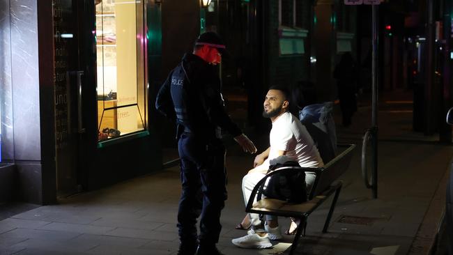 NSW police officers from the Raptor Squad stop and search Mohamad Alameddine. Picture: Matrix