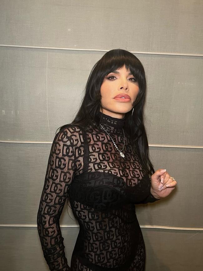 She switched up her look earlier in the weekend, wearing clip-in bangs and another see-through look. Picture: laurensanchez/Instagram