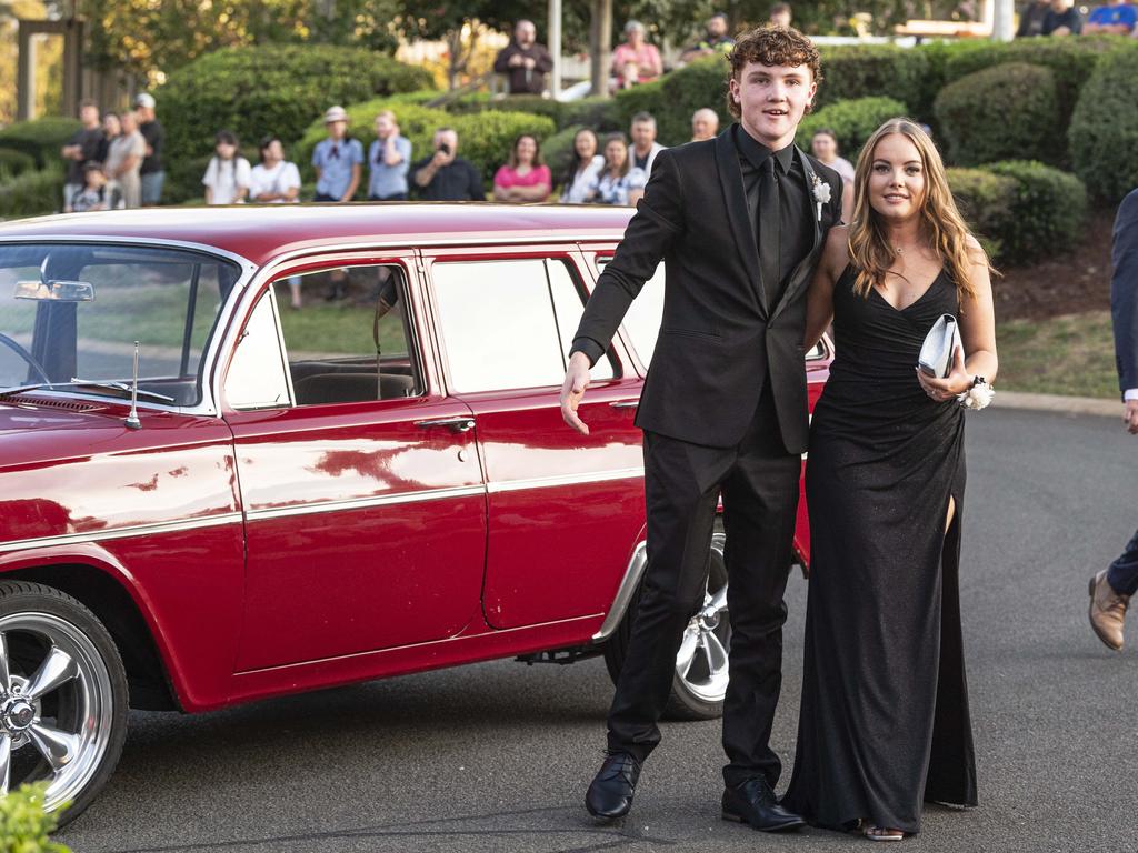 Graduate Aidan Lipp and partner Jess Carnell arrive at Mary MacKillop Catholic College formal at Highfields Cultural Centre, Thursday, November 14, 2024. Picture: Kevin Farmer