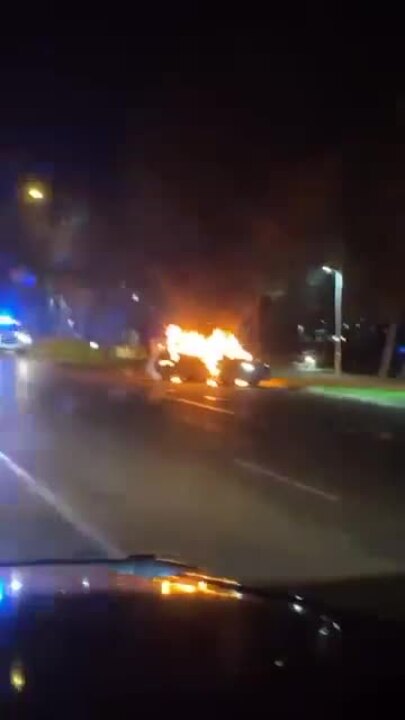 A vehicle is consumed by fire overnight along The Strand