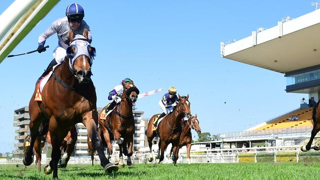 Ronnie Stewart rounds out a winning double at Doomben aboard Hell. Picture: Grant Peters / Trackside Photography