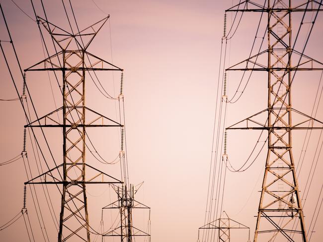 Massive power lines stretch into the distance