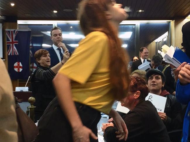 Mr Pearson was infamous spat at by protester Nicky Minus at first amalgamated Inner West Council meeting.