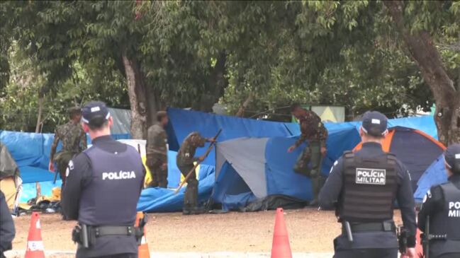 Bolsonaro supporters leave camp, soldiers move in