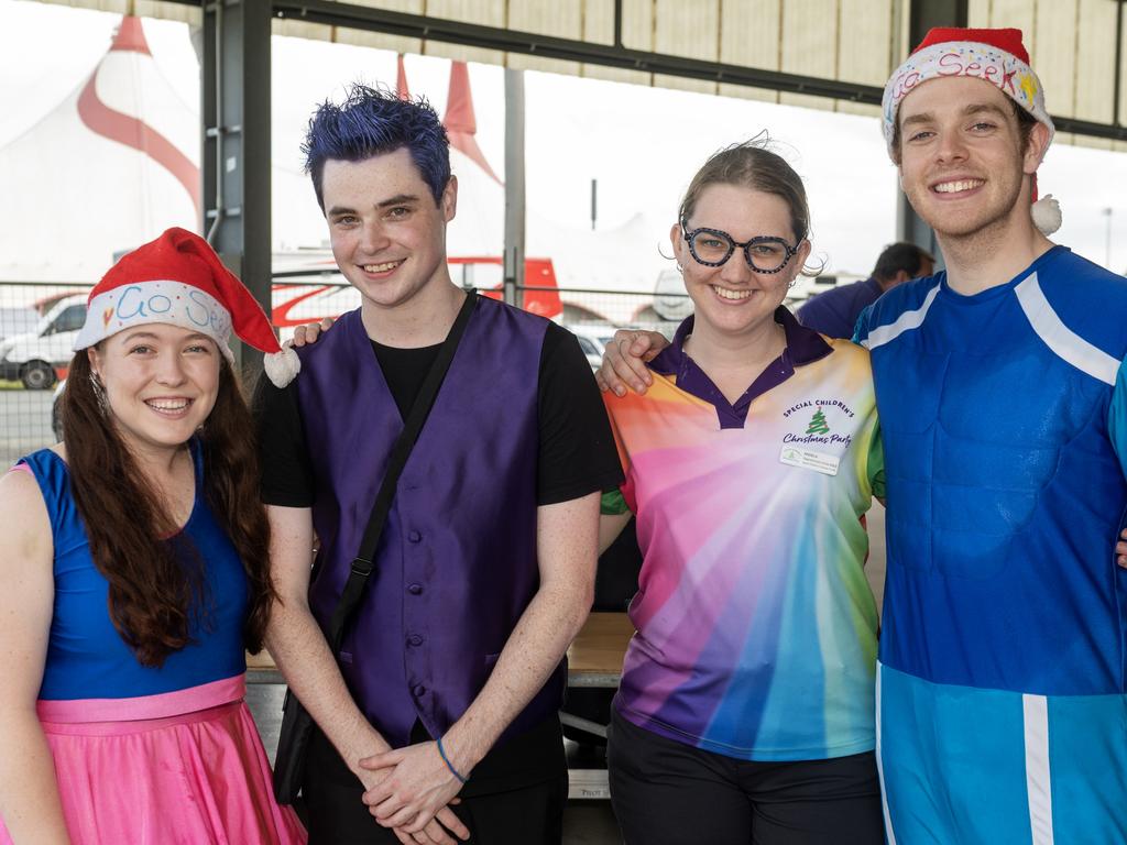 Sharee Muller, Magic Jake, Angela Hodson and Nicholas Joy from go seek at Special Childrens Christmas Party Mackay Saturday 19 Novemeber 2022. Picture: Michaela Harlow