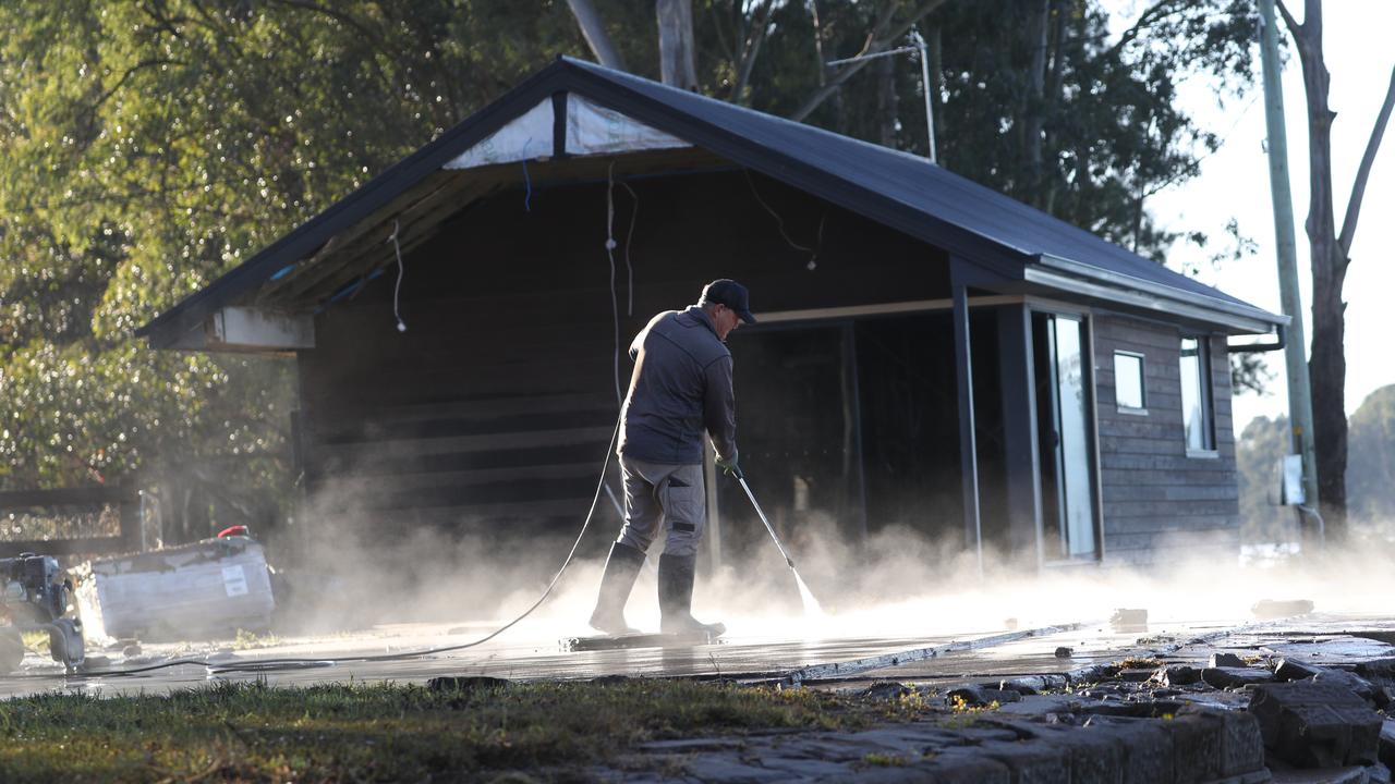 Residents along Hawkesbury River start to clean up as sun-filled skies return. Picture: John Grainger