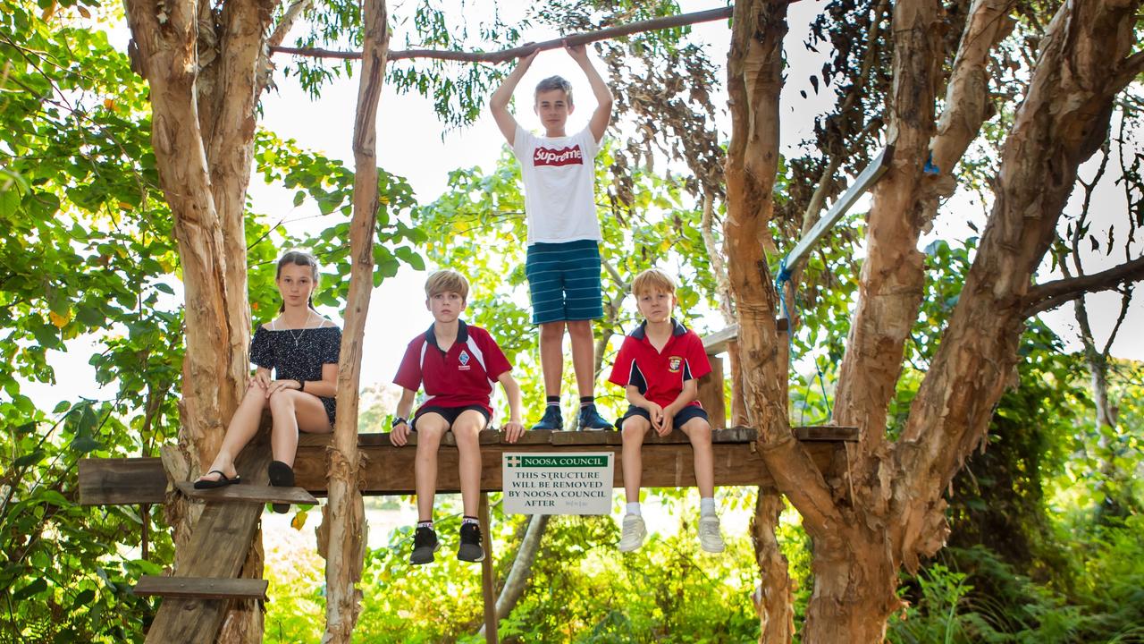 Riley Diamond with the local neighbourhood kids who love their treehouse. Picture: Lisa Diamond