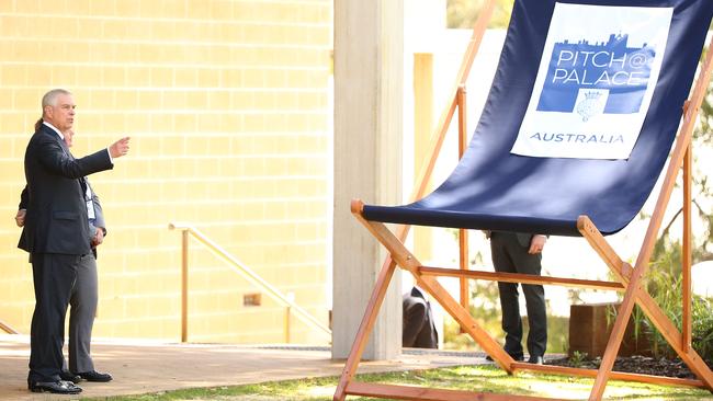 Prince Andrew looks at Pitch@Palace logos at Murdoch University in Perth. Picture: Getty