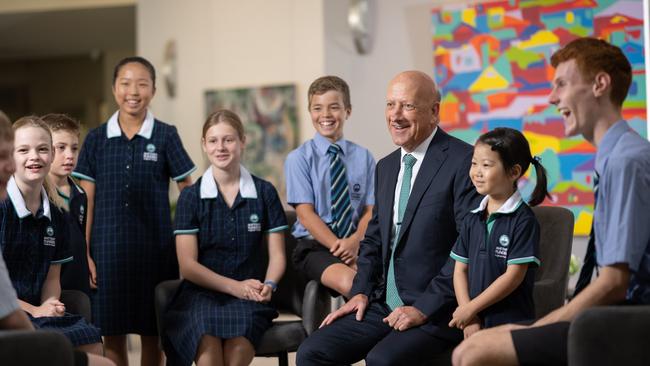 Matthew Flinders Anglican College principal Stuart Meade, pictured with students in 2022, has resigned with 2023 his final year at the school after seven years of dedicated leadership.