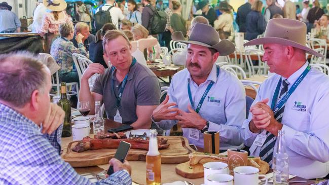 Journalist Michael Madigan dining with Premier Steven Miles, Beef Australia's Bryce Camm and Grant Cassidy at Beef 2024 in Rockhampton. Photo: Steve Vit.