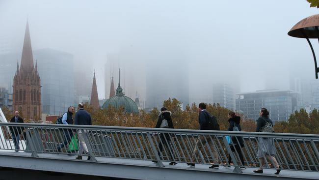 A foggy commute. Picture: David Crosling