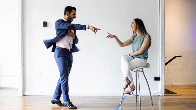 Carlton dance studio owner Angela Fayth gives a pointer to student Vikram Saran: she is currently allowed only nine people in the studio at one time. Picture: Aaron Francis