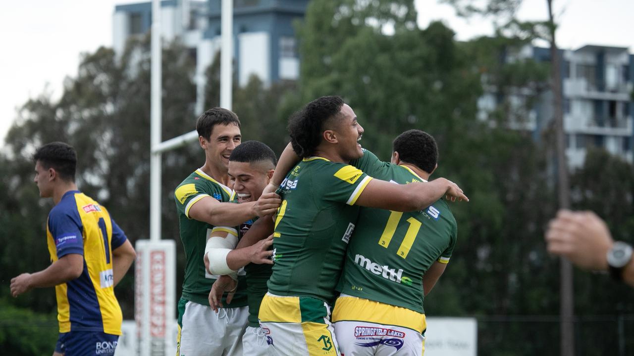 James Martens celebrates with the Vaihu brothers and Lebron Naea (centre). Photo courtesy of Holly Hope Creative.