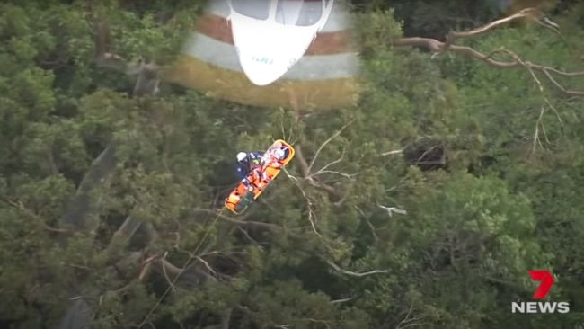 One of the two critically injured victims being winched into a chopper. Picture: 7 News