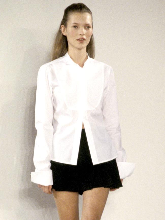 Kate Moss in a pleated miniskirt, 1995. Picture: Getty