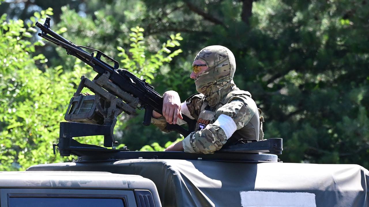 A Russian serviceman patrols outside the town of Schast'ye on June 11. Picture: AFP